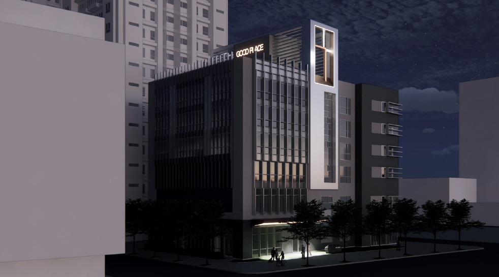 台北信義會蒙恩堂建築渲染圖:夜間街角的教會建築與十字立面